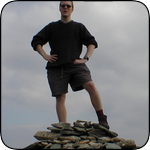 Steve standing on the summit of the Old Man of Coniston